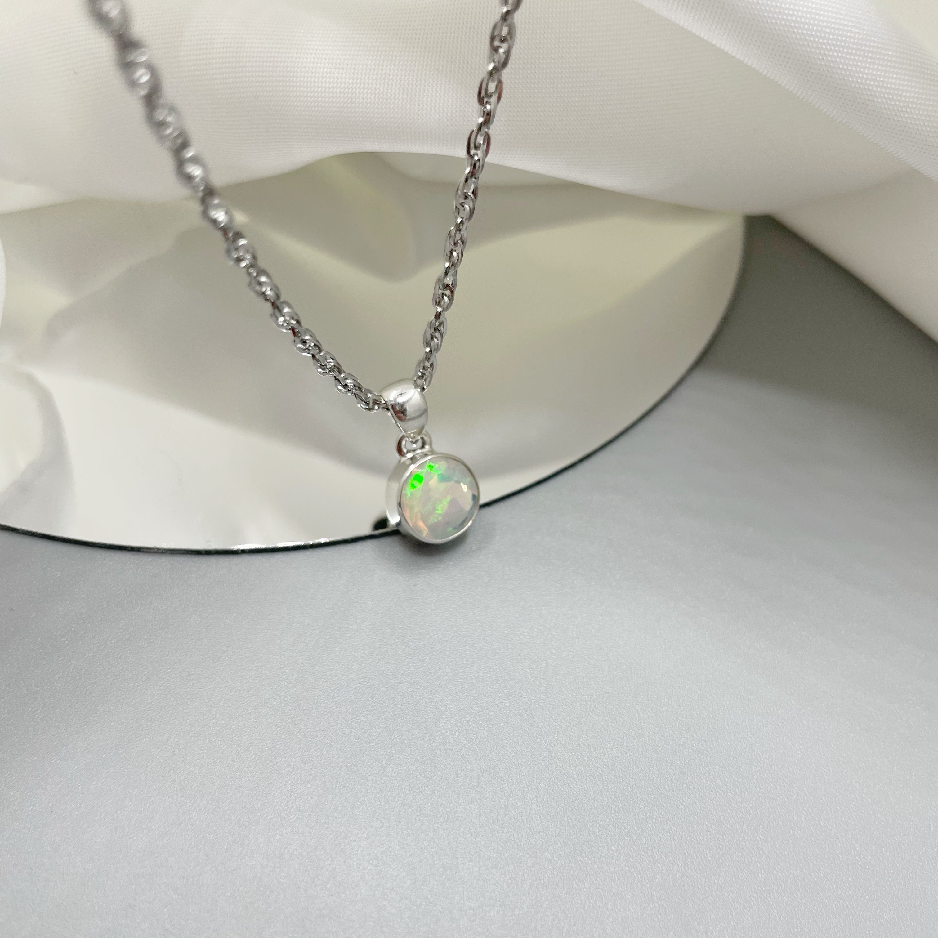 Ciondolo Opale Etiope Sfaccettato Tondo - Argento 925