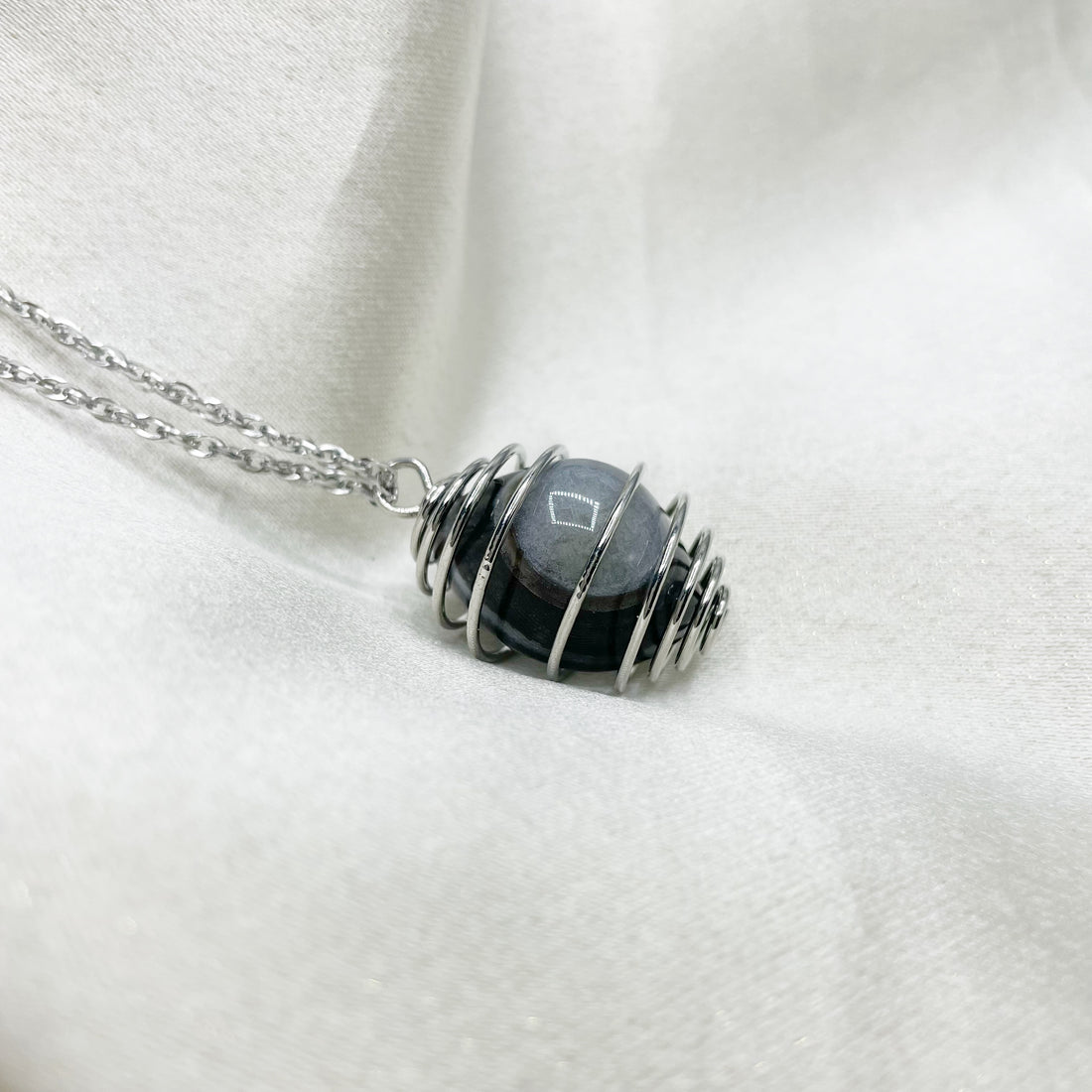 Collana Occhio di Shiva con Gabbietta - Acciaio Inossidabile