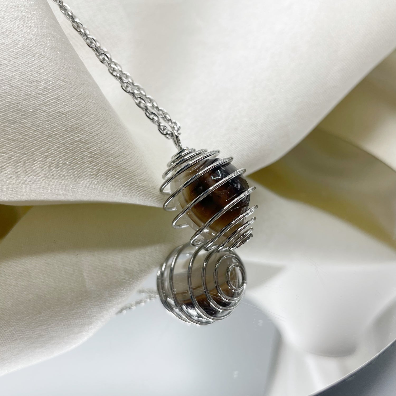 Collana Occhio di Shiva con Gabbietta - Acciaio Inossidabile