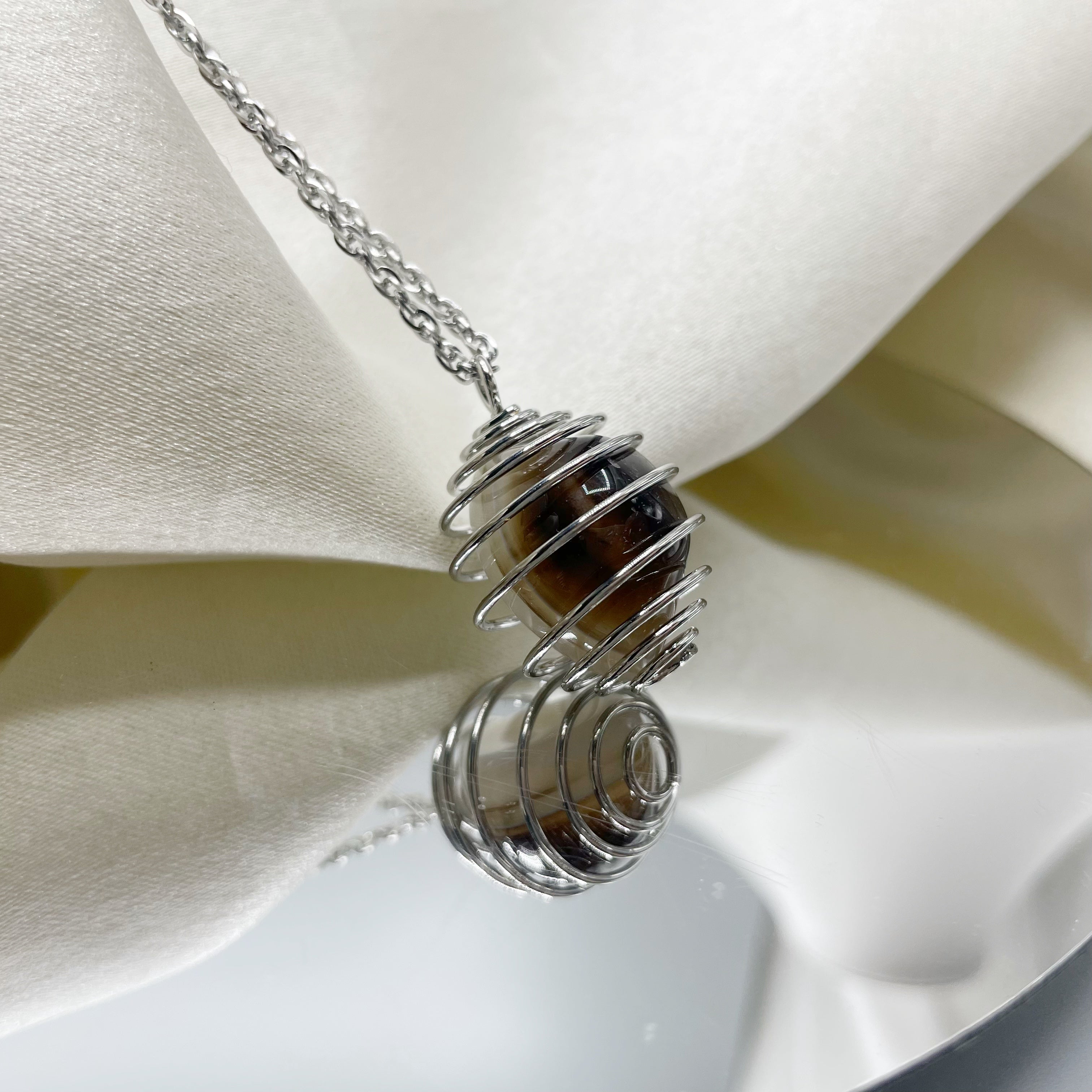 Collana Occhio di Shiva con Gabbietta - Acciaio Inossidabile