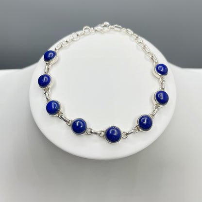 Bracciale in argento 925 con maglie in lapislazzuli e ciondolo Bracciale in argento 925 con maglie in lapislazzuli e ciondolo