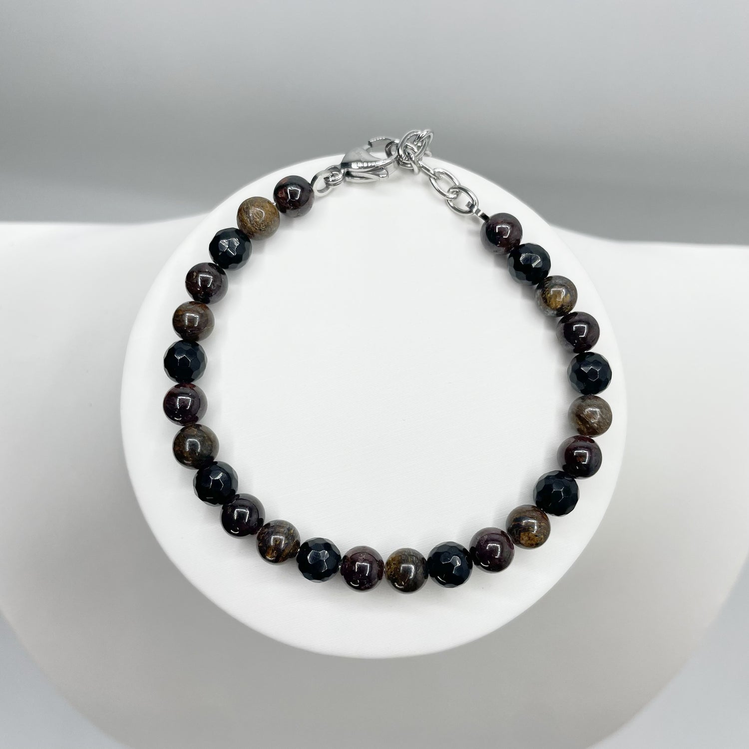 Bracciale Infinite Possibilità - Bronzite, Granato e Ossidiana