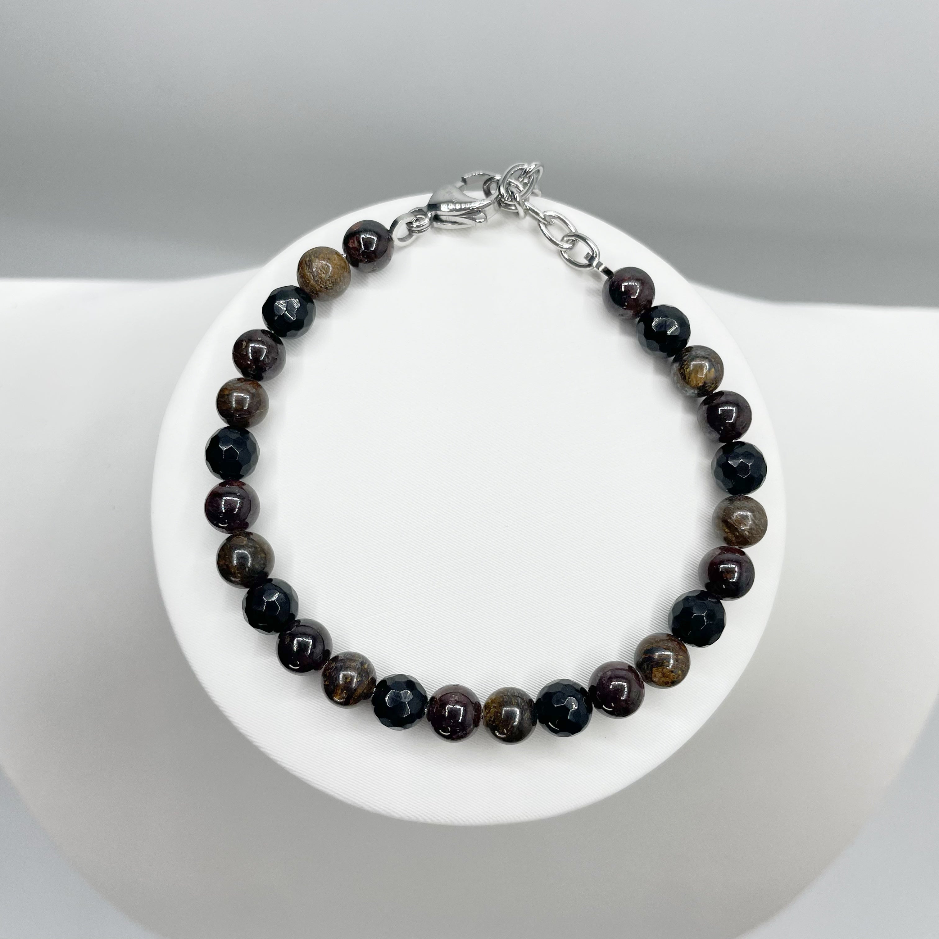 Bracciale Infinite Possibilità - Bronzite, Granato e Ossidiana