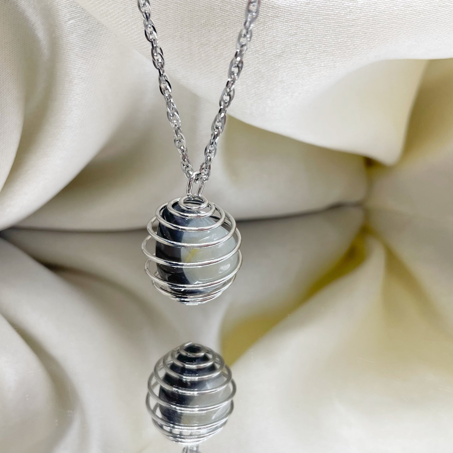 Collana Occhio di Shiva con Gabbietta - Acciaio Inossidabile
