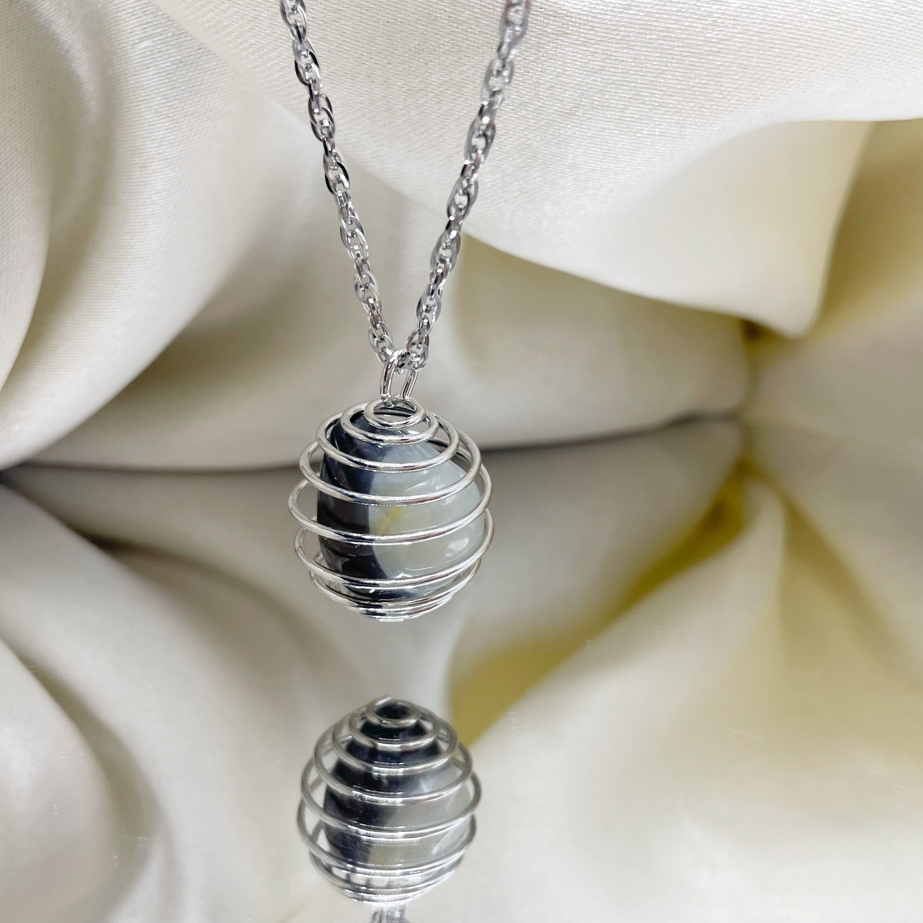 Collana Occhio di Shiva con Gabbietta - Acciaio Inossidabile